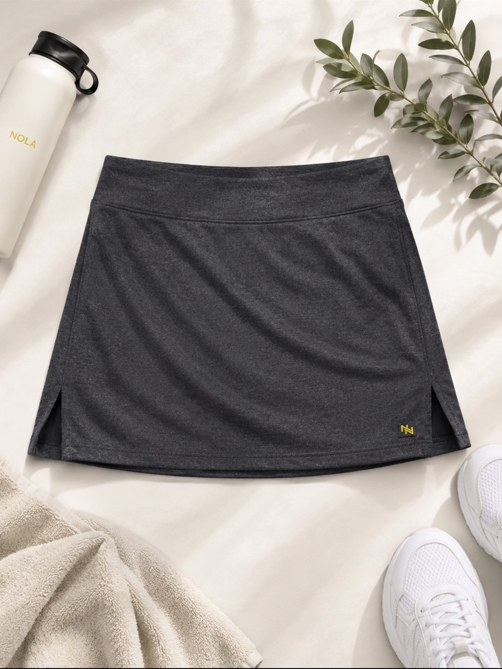 Nola Gray Performance Skort with Yellow Logo Tag